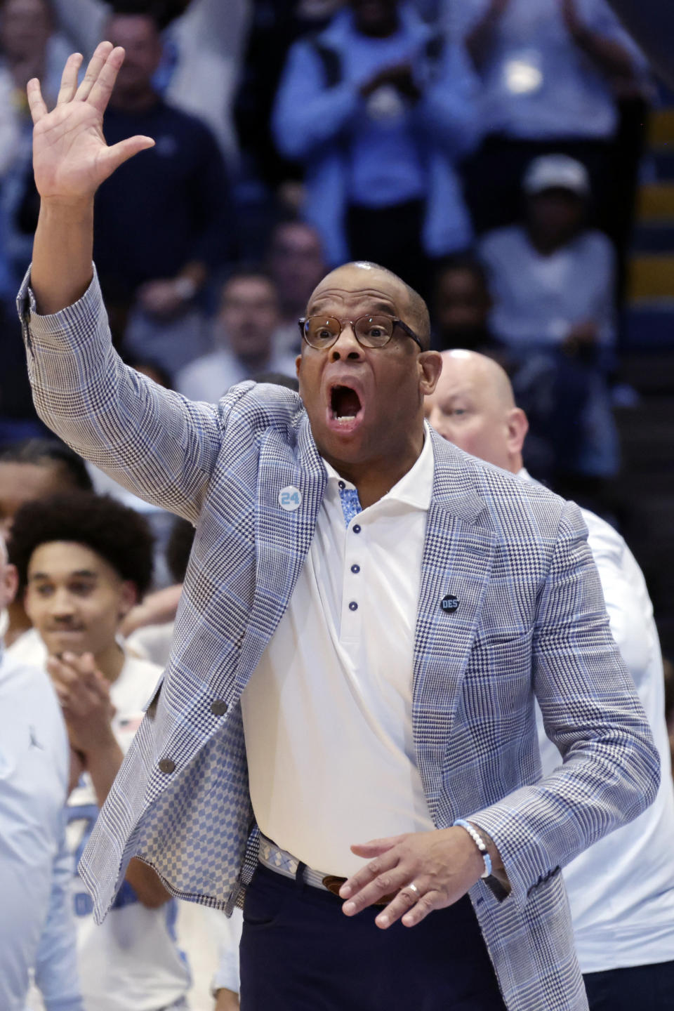North Carolina head coach Hubert Davis gestures during the second half of an NCAA college basketball game against Duke Saturday, Feb. 3, 2024, in Chapel Hill, N.C. (AP Photo/Chris Seward)