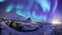 <p>The Aurora Borealis, arguably the most spectacular natural phenomenon, on full display over Mount Kirkjufell in Iceland.</p>