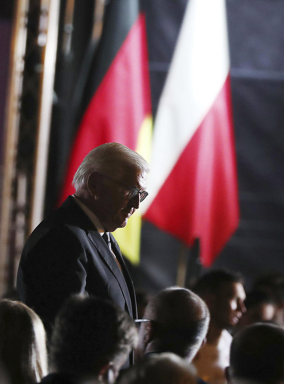 Germany's President Frank-Walter Steinmeier walks after speaks at the commemoration ceremony marking the 80th anniversary of World War II in Wielun, Poland, Sunday, Sept. 1, 2019. The ceremony take place at Wielun and at the exact time – 4.40 a.m. when Nazi Germany dropped its first bombs in the World War II. at the Polish city. (AP Photo/Czarek Sokolowski)