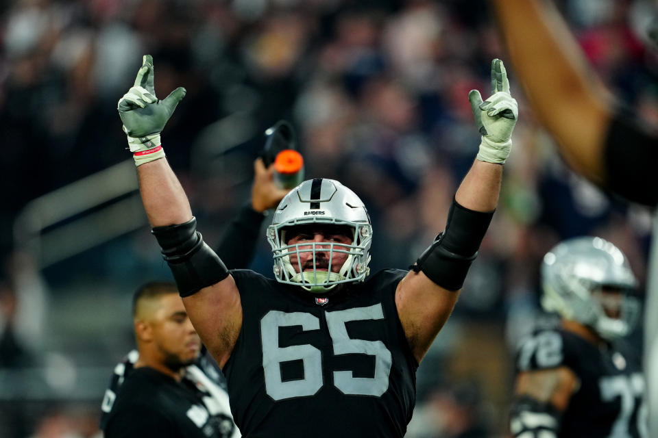 LAS VEGAS, NEVADA – DECEMBER 18: Hroniss Grasu #65 of the Las Vegas Raiders reacts during the second half against the New England Patriots at Allegiant Stadium on December 18, 2022 in Las Vegas, Nevada. (Photo by Jeff Bottari/Getty Images)