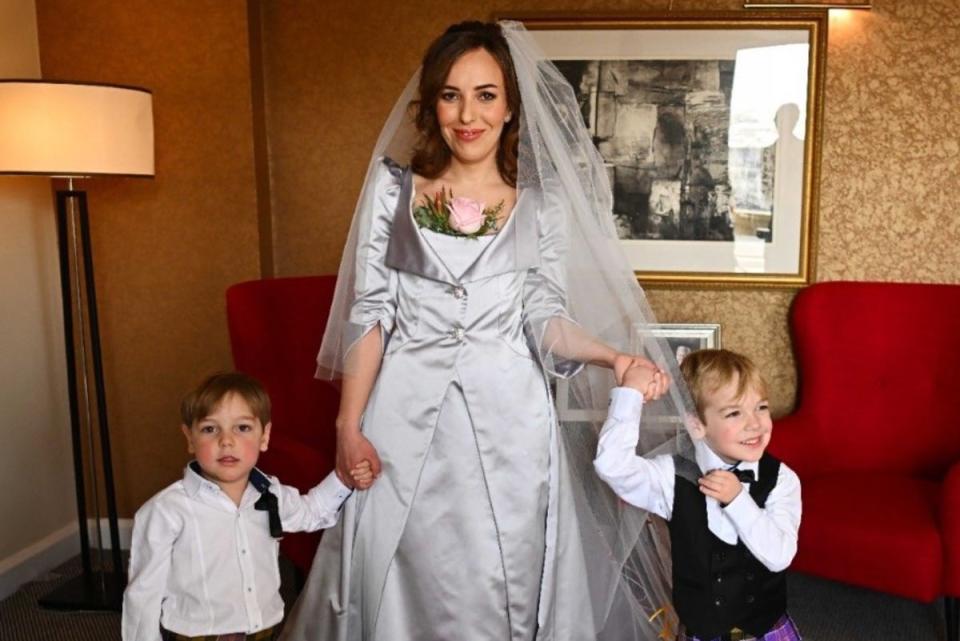 Stella Morris in her Westwood wedding dress and her sons in Westwood suits and kilts.  Assange also wore a matching Westwood kilt (Stella Morris)