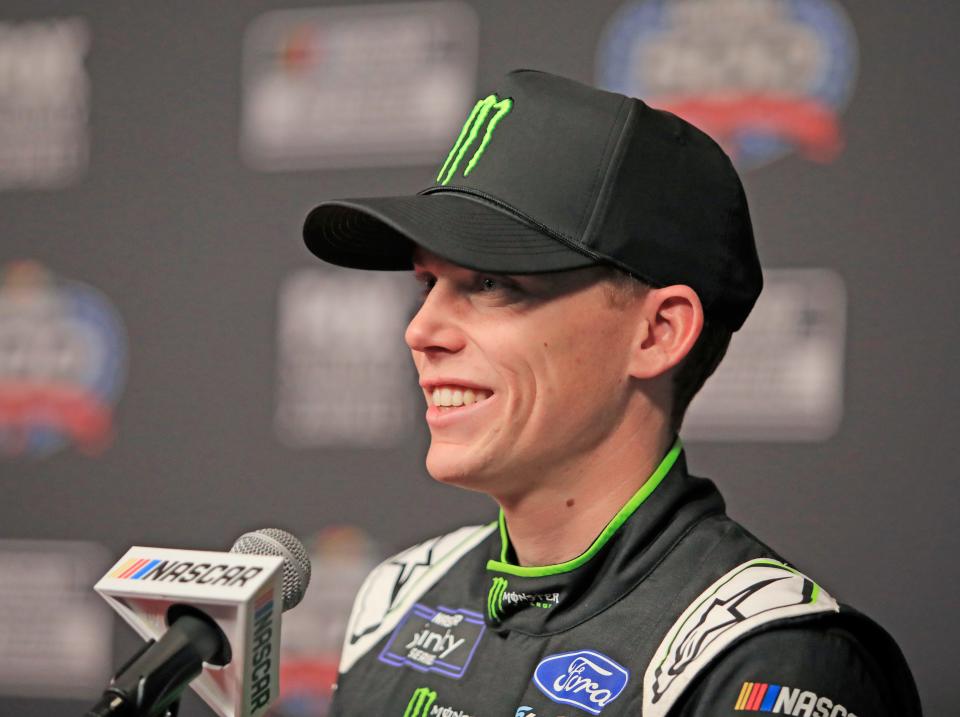 Riley Herbst answers questions from the media during Media Day at Daytona International Speedway, Wednesday, Feb. 14, 2024.