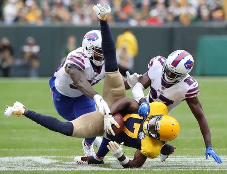 Sep 30, 2018; Green Bay, WI, USA; Green Bay Packers wide receiver Davante Adams (17) is tackled during the first half against the Buffalo Bills at Lambeau Field. Mandatory Credit: Jim Matthews/Wisconsin via USA TODAY NETWORK