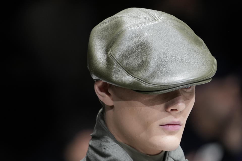 A model wears a creation as part of the Emporio Armani menswear Fall-Winter 2023-24 collection presented in Milan, Italy, Saturday, Jan. 14, 2023. (AP Photo/Luca Bruno)