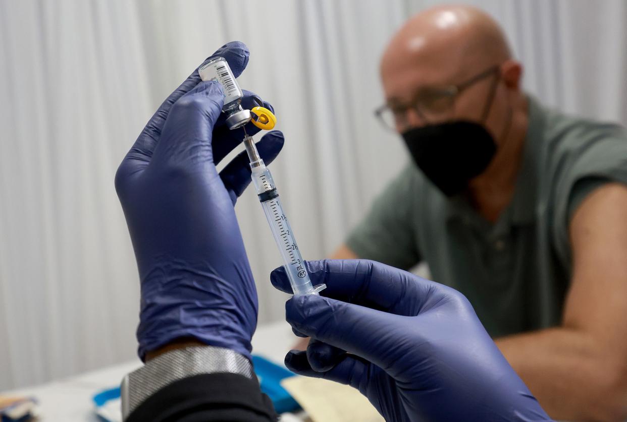 A healthcare worker prepares to administer a vaccine for the prevention of monkeypox in Wilton Manors, Florida on July 12, 2022. 