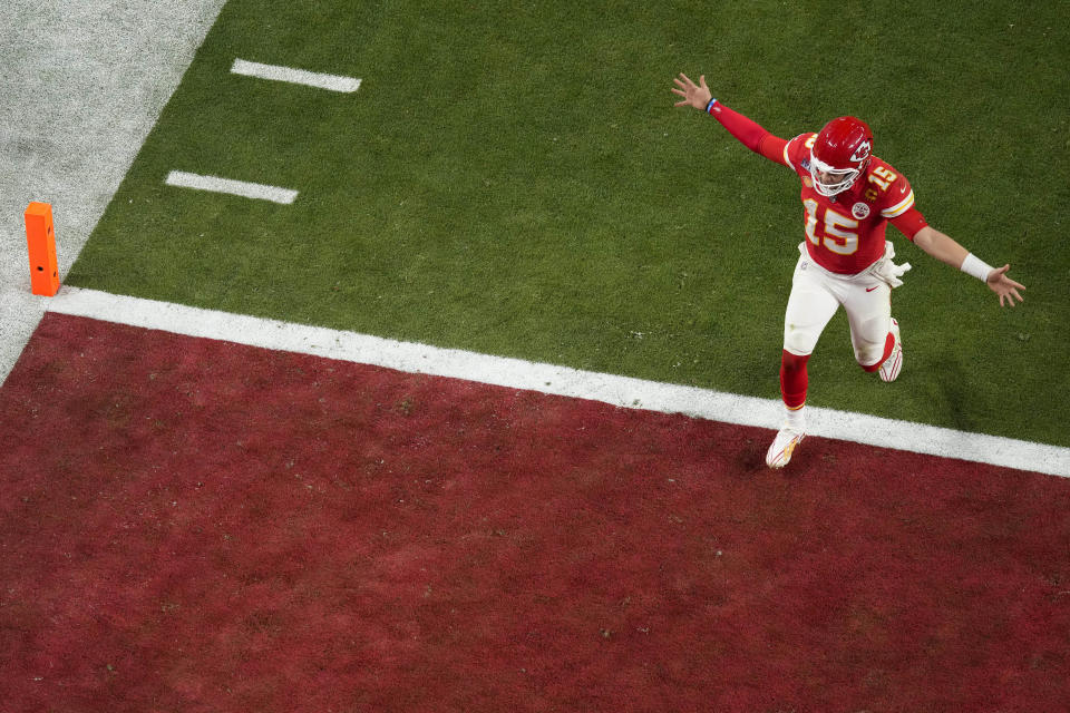 Kansas City Chiefs quarterback Patrick Mahomes celebrates after throwing the game-winning touchdown against the San Francisco 49ers during overtime of the NFL Super Bowl 58 football game Sunday, Feb. 11, 2024, in Las Vegas. (AP Photo/David J. Phillip)