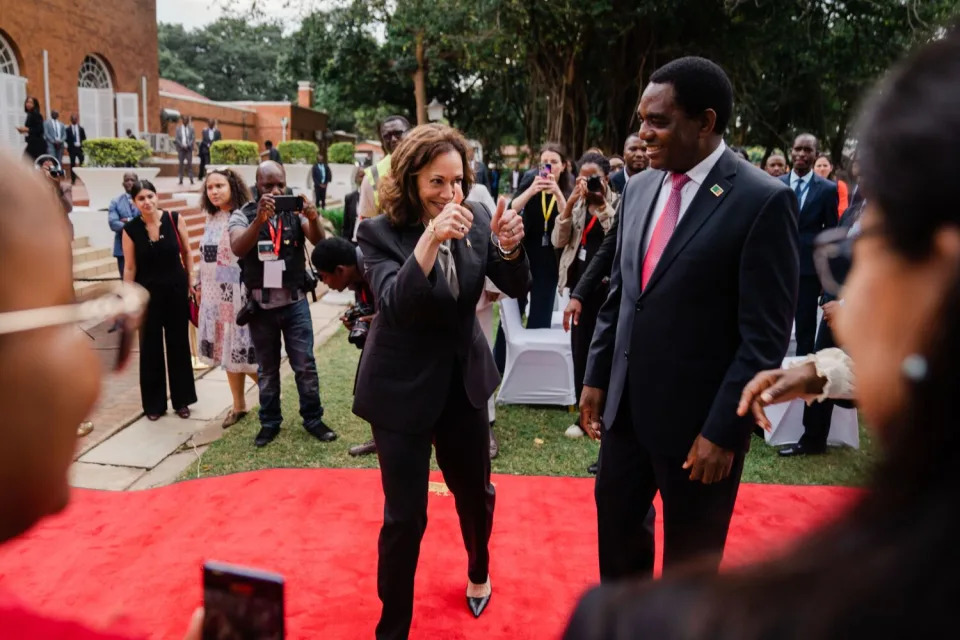 Vice President Kamala Harris and President Hakainde Hichilema of Zambia greet people following a press conference