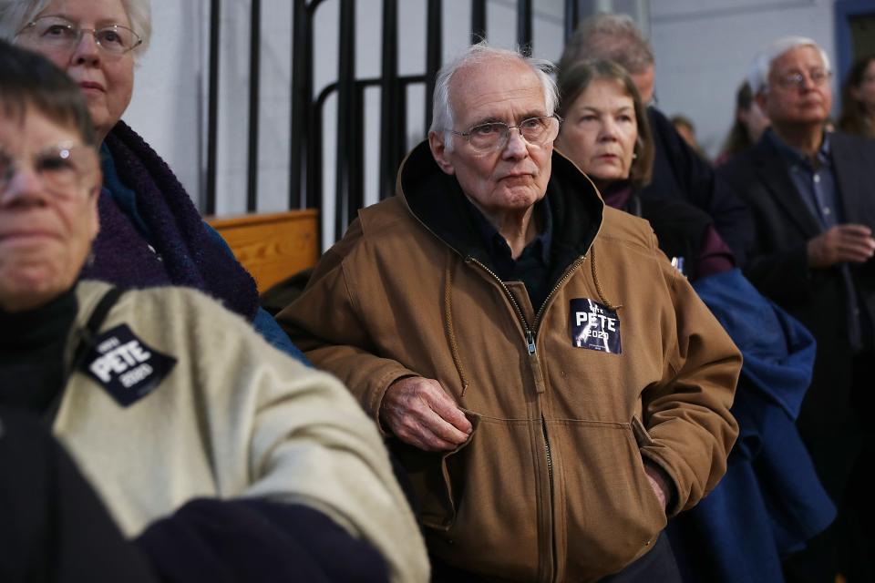 People listen as Democratic presidential candidate Pete Buttigieg speaks at a town hall at the Walpole Middle School on Nov/ 10, 2019 in Walpole, New Hampshire.