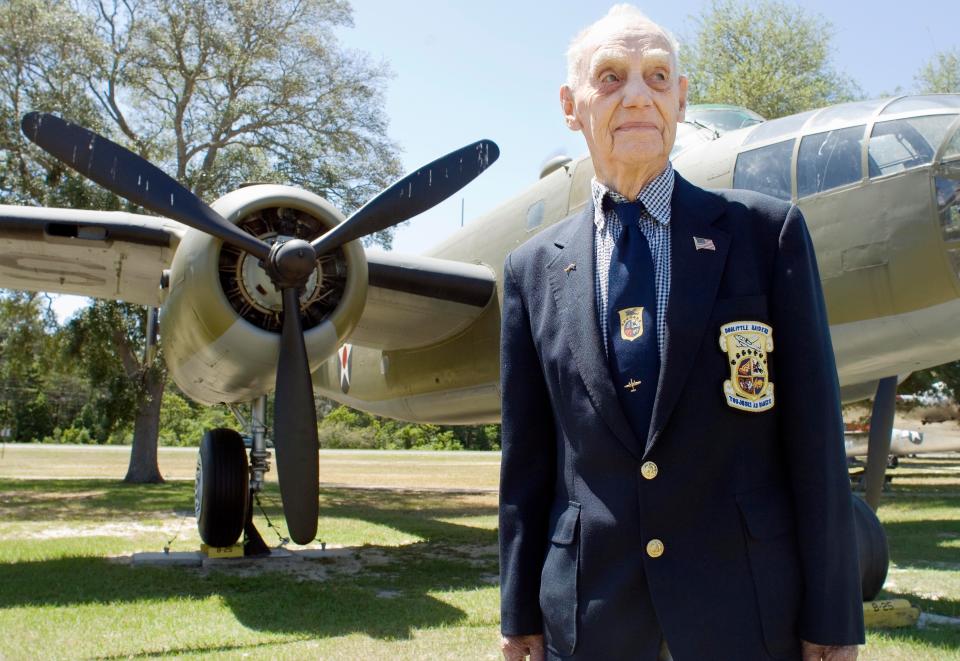 Doolittle Raider Ed Horton is pictured in this Daily News photo from May 2008 in front of a B-25 bomber like the one he flew in during  the 1942 raid on Japan.