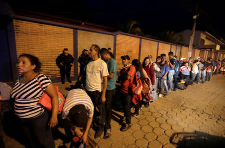 Honduran migrants, part of a caravan trying to reach the U.S., are seen after arriving in Esquipulas city in Guatemala, October 15, 2018. REUTERS/Jorge Cabrera