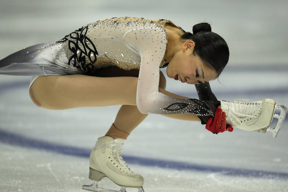 Bronze medalist Japan's Hana Yoshida performs her Free Skating routine in the Women's Final of the ISU Grand Prix of Figure Skating Final held in Beijing, Saturday, Dec. 9, 2023. (AP Photo/Ng Han Guan)