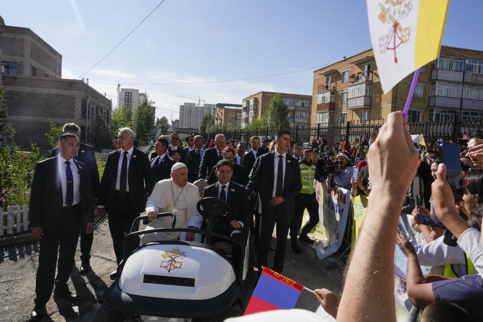 Pope Francis arrives at Saints Peter and Paul Catholic Cathedral in Ulaanbaatar, Saturday, Sept. 2, 2023, for a meeting with the local clergy. Pope Francis has praised Mongolia's tradition of religious freedom dating to the times of its founder, Genghis Khan, as he opened the first-ever papal visit to the Asian nation with a plea for peace and an end to the "insidious threat of corruption." (AP Photo/Louise Delmotte)