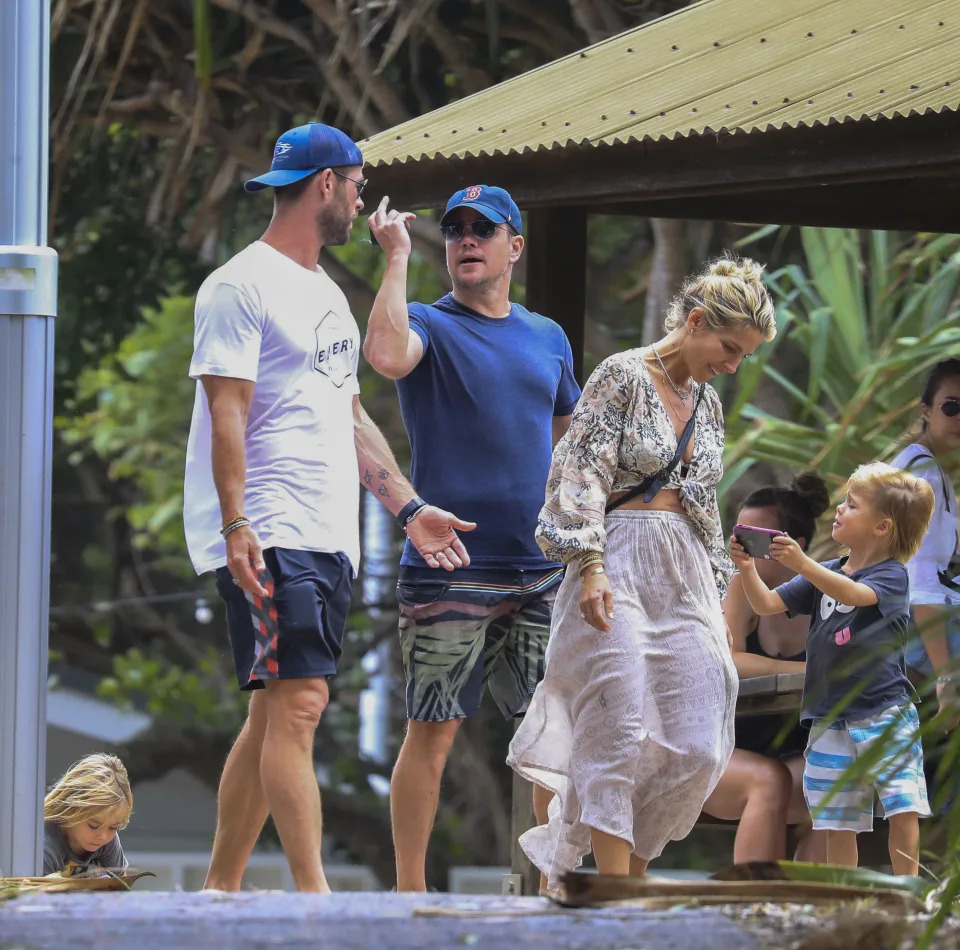 Keeping things casual in t-shirts and shorts, the actor also wore matching blue baseball caps and sunglasses.. Photo: Media-Mode