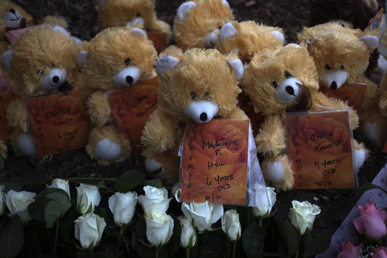 The names of victims from the Sandy Hook shooting are attached to teddy bears, part of a memorial in Sandy Hook Village two days after the shooting. (Photo: Adrees Latif/Reuters)