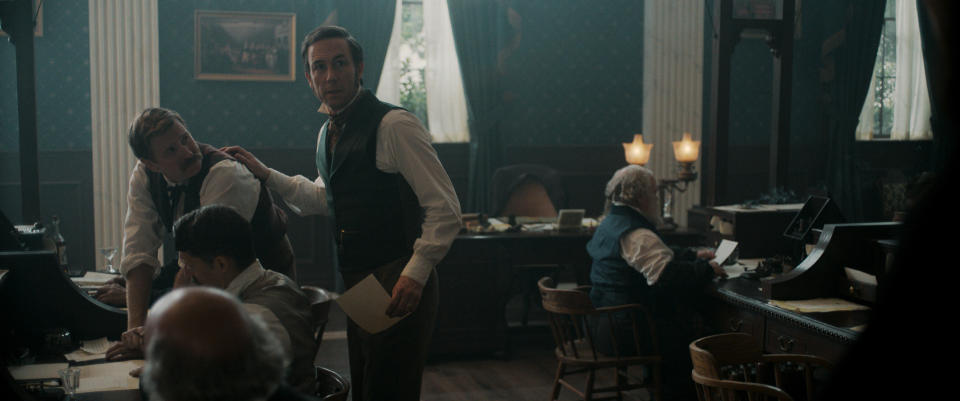 Actor Tobias Menzies (center) plays Secretary of War Edwin Stanton, who leads the manhunt for John Wilkes Booth.<span class="copyright">Courtesy of Apple TV+</span>