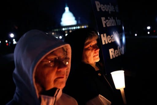 Nuns belonging to the Leadership Conference of Women Religious participate in a candlelight vigil to call for "public option" on healthcare reform in Washington in 2009. The Vatican has issued a scathing condemnation of the group, the main association of Catholic nuns in the United States, for taking liberal stances on contraception, homosexuality and female priests