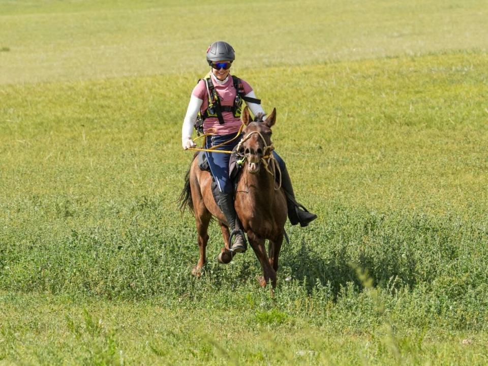 Helicopter pilot Adele Dobler, shown here, participated in the Mongol Derby, what is considered to be the world's longest and toughest horse race. (Shari Thompson - image credit)
