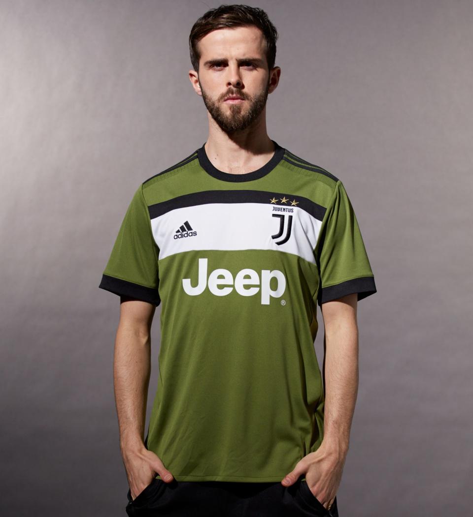 Miralem Pjanic poses in Juventus' new green kit - Credit: ADIDAS