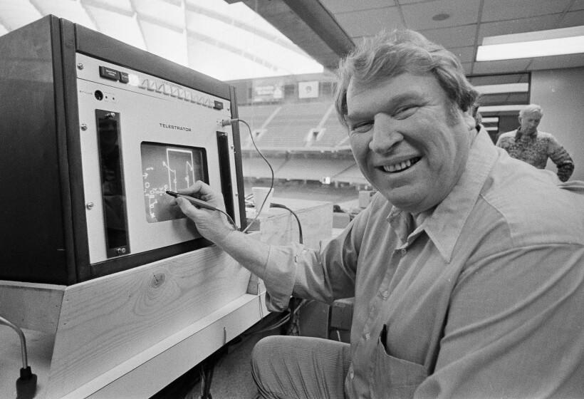 FILE - Former Oakland Raiders coach John Madden practices the electronic charting device Telestrator on Jan. 21, 1982, in Pontiac, Mich., for the upcoming NFL football Super Bowl broadcast on CBS. Madden, the Hall of Fame coach turned broadcaster whose exuberant calls combined with simple explanations provided a weekly soundtrack to NFL games for three decades, died Tuesday morning, Dec. 28, 2021, the league said. He was 85. The NFL said he died unexpectedly and did not detail a cause. (AP Photo, File)