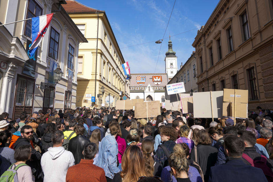 Anti-government protesters gather at the St. Mark square in Zagreb, Croatia, Saturday, Feb. 17, 2024. Thousands have gathered near the government site to denounce corruption related to HDZ ruling party in Croatia. (AP Photo/Darko Bandic)