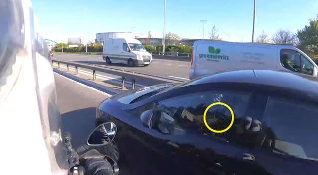 He was hirrified to see the woman was just distracted while scrolling through her iPad during traffic. Source: YouTube