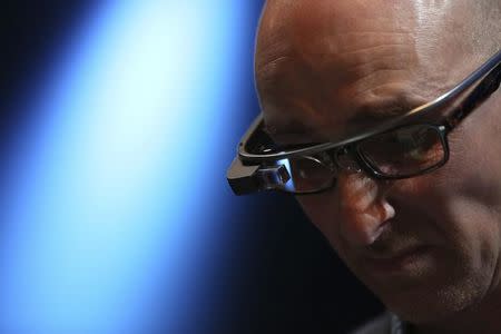 A man wears a Google Glass at Apple's Worldwide Developers Conference in San Francisco, California June 2, 2014. REUTERS/Robert Galbraith