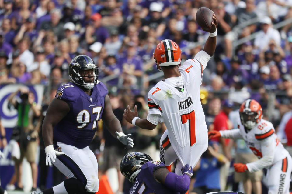 <p>Outside linebacker Terrell Suggs #55 of the Baltimore Ravens tries to take down quarterback DeShone Kizer #7 of the Cleveland Browns in the four quarter at M&T Bank Stadium on September 17, 2017 in Baltimore, Maryland. (Photo by Rob Carr /Getty Images) </p>