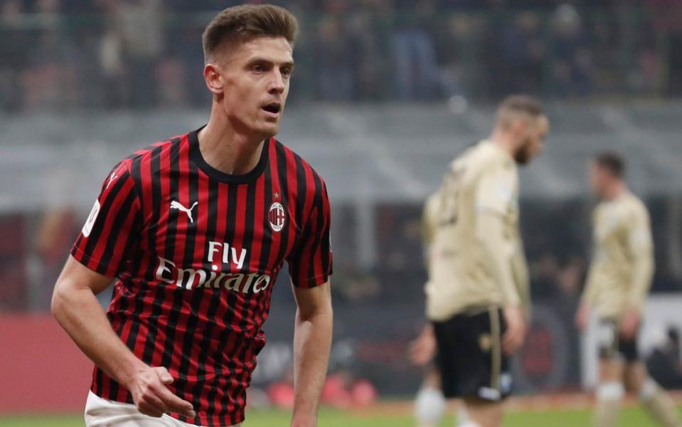 Krzysztof Piatek may be playing in England soon with both Spurs and Chelsea interested in the Pole - AP