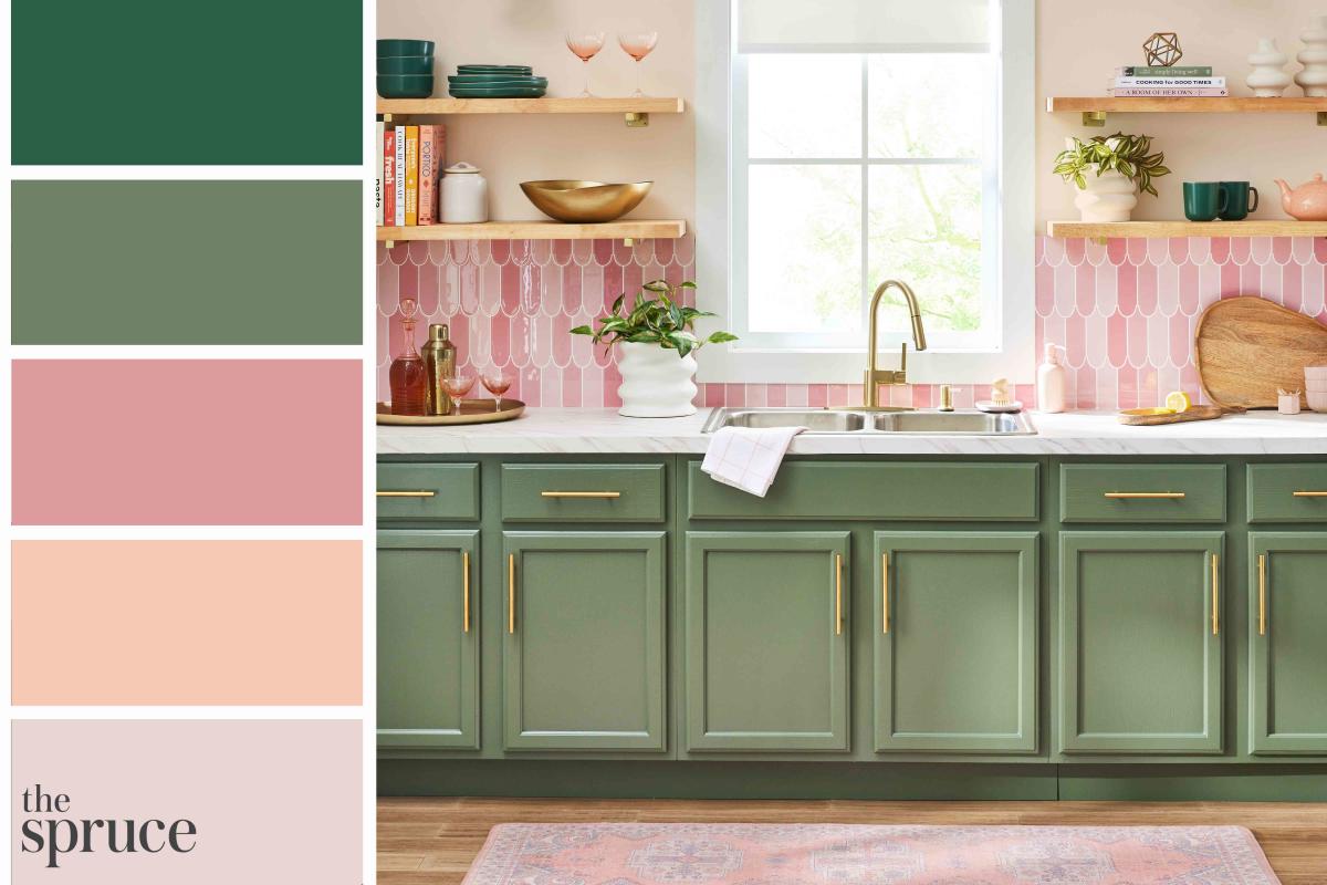 Sage green kitchen cabinets in a green color palette apartment