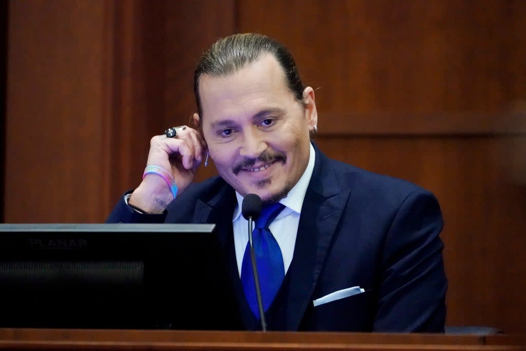 Johnny Depp said texts about drowning Amber Heard were based on a Monty Python sketch (Steve Helber/AP) (AP)