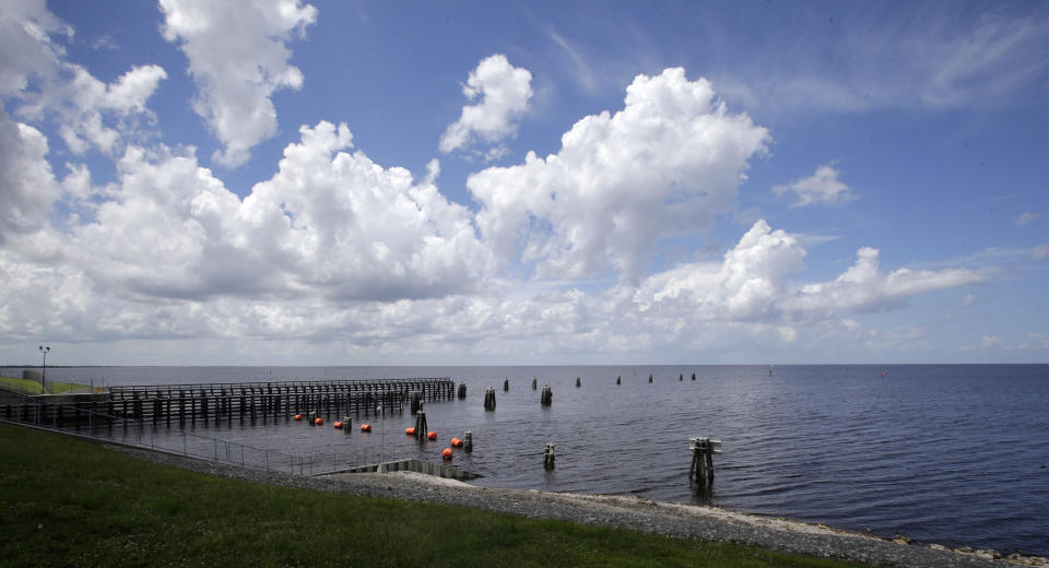 In this Friday, Aug. 9, 2013 photo, Port Mayaca Lock & Dam in Lake Okeechobee, Fla., is seen. A Tallahassee lawmaker called on Florida’s congressional delegation to help the state take charge of controlling how water is released from Lake Okeechobee. The lake and water woes from Florida’s Big Bend to the state’s natural springs to a treasured estuary along the Atlantic have prompted residents, lawmakers and environmental advocates to call on the state to do more to better manage its water resources. (AP Photo/Alan Diaz)