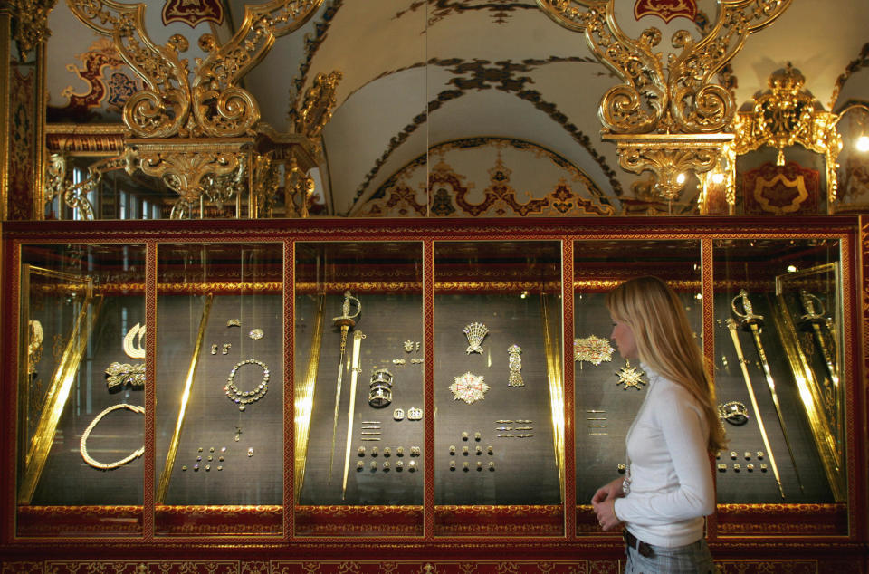 File photo of a woman looking at precious objects in the Jewel Room of the Green Vault State Art Collection in Dresden, Germany, in 2006.  / Credit: Norbert Millauer / Getty