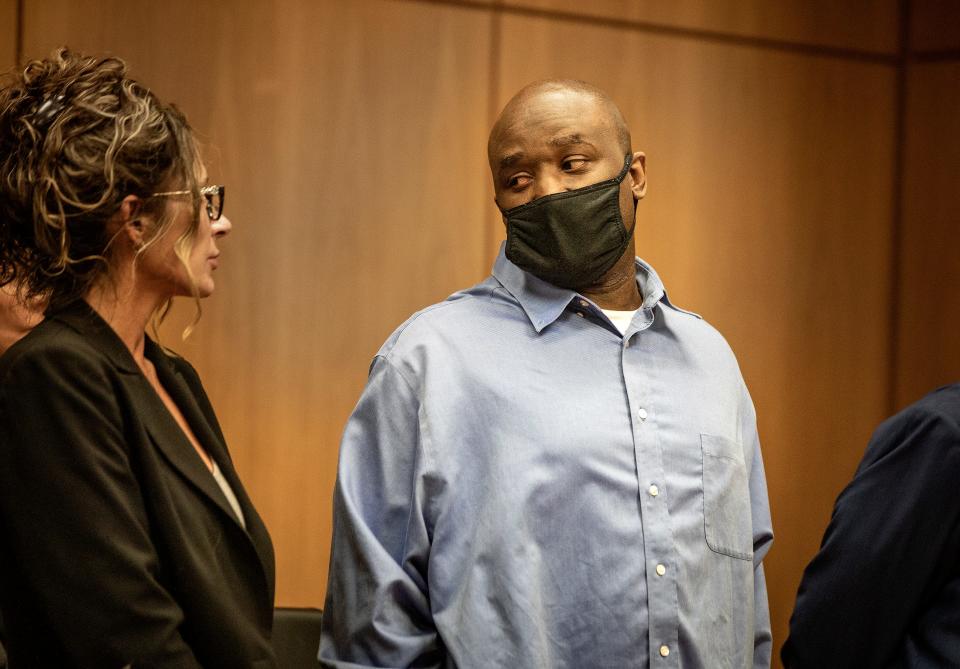 Marcelle Waldon looks over to defense attorney Debra Tuomey on Tuesday after a jury recommended the death penalty for the murders of Edie Yates Henderson and David Henderson in 2020.