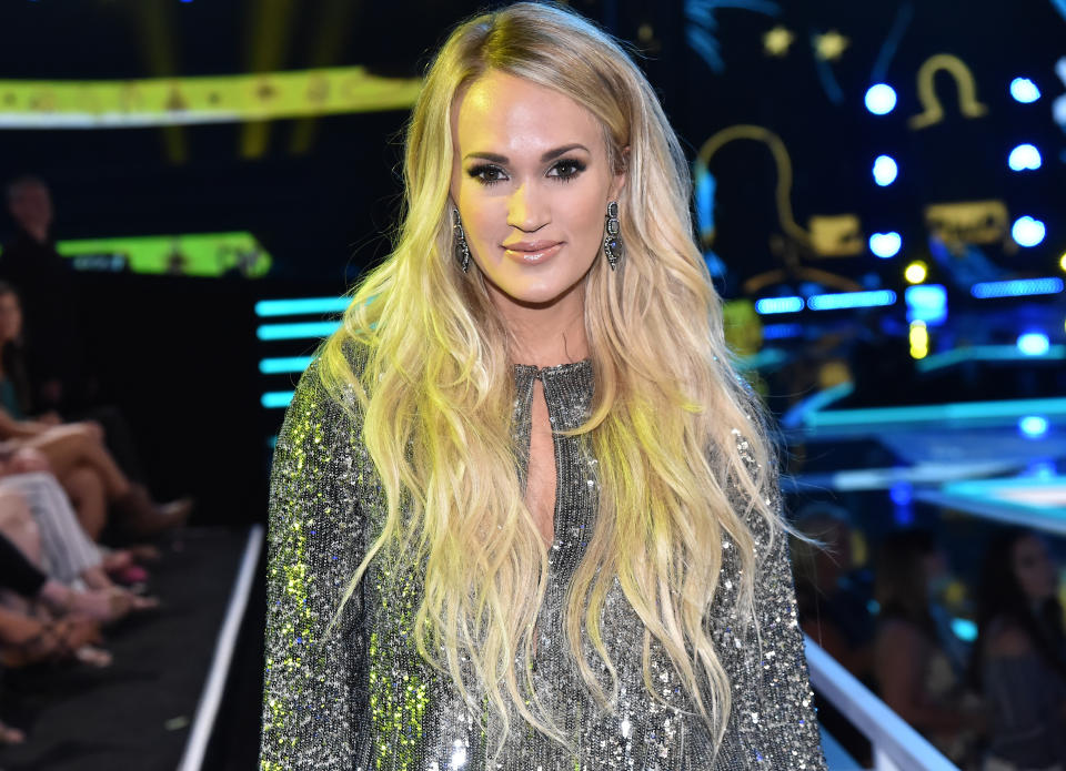 Carrie Underwood, pictured at the 2018 CMT Music Awards on June 6, 2018, reflects on her facial injury — and the online rumors about it. (Photo: Jeff Kravitz/FilmMagic)