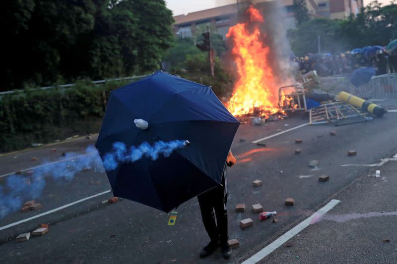 Pictures of the Year: Hong Kong protest tide turns into sea of flames