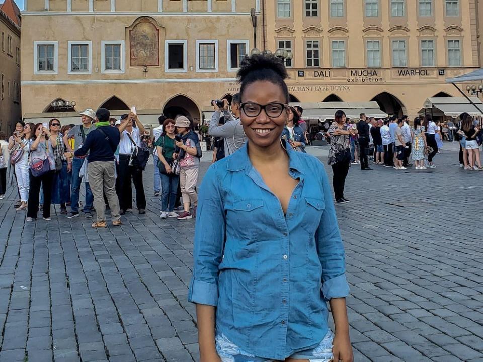 The writer in front of a cathedral in the Czech Republic