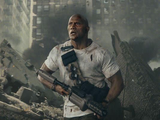 The Rock fights giant monster animals in the first trailer for Rampage. Source: Warner Bros