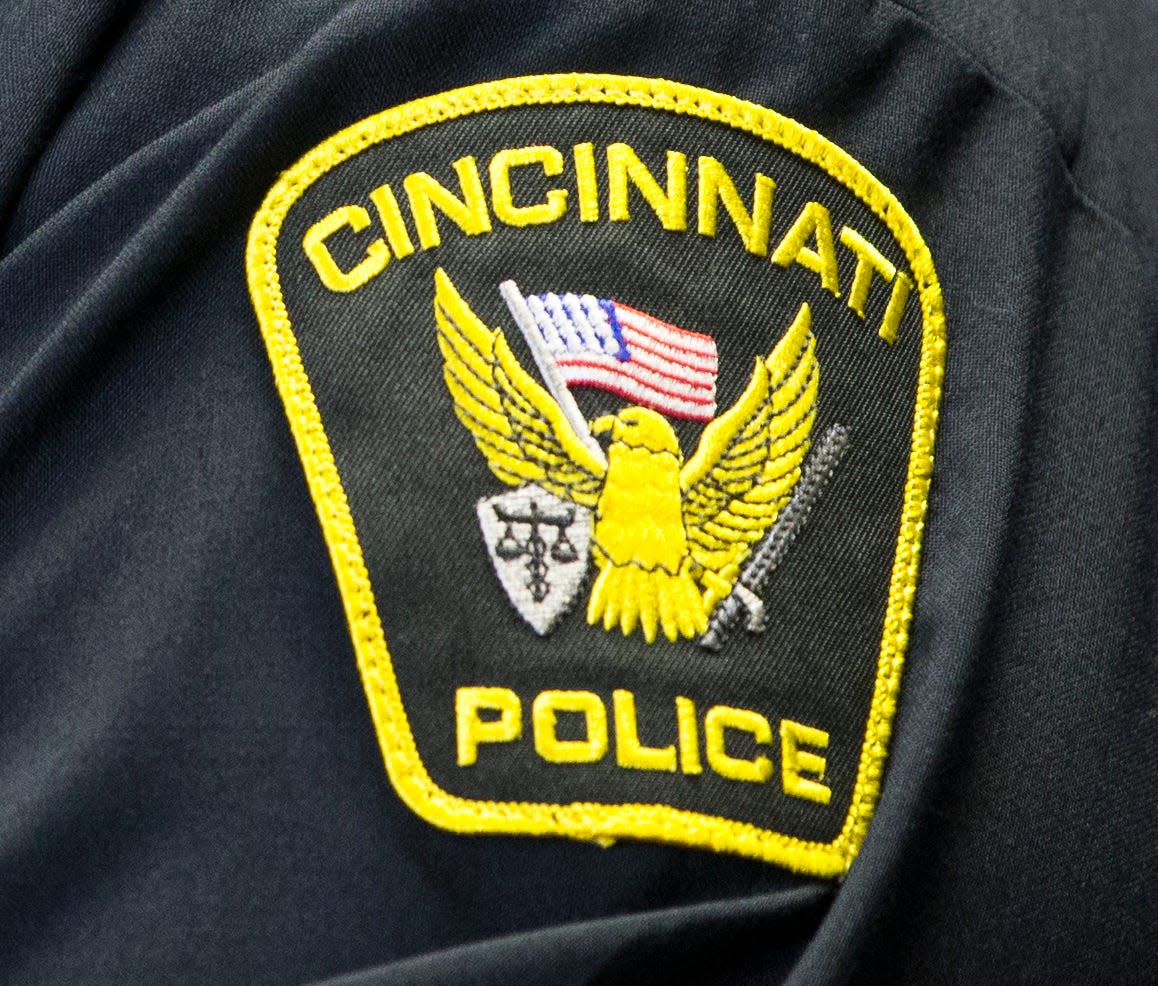 A Cincinnati police officer was indicted Monday on charges he illegally accessed a law enforcement database to obtain personal information about a 19-year-old woman, prosecutors said.
