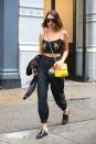 <p>Bella Hadid wears the I.AM.GIA Cobain cargo pants in black. (Photo: Backgrid) </p>