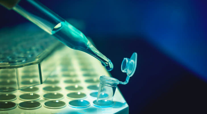 Photo of a dropper dropping liquid into a test tube. Symbolizes gene editing.