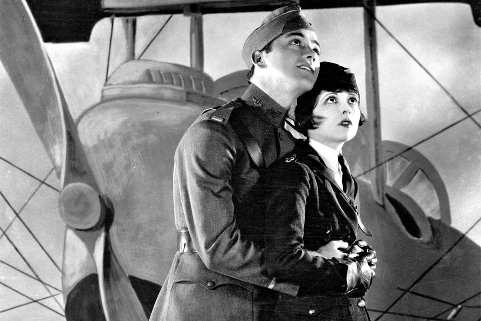 Wings (1927) Directed by William A. Wellman Shown from left: Charles 'Buddy' Rogers, Clara Bow, Richard Arlen