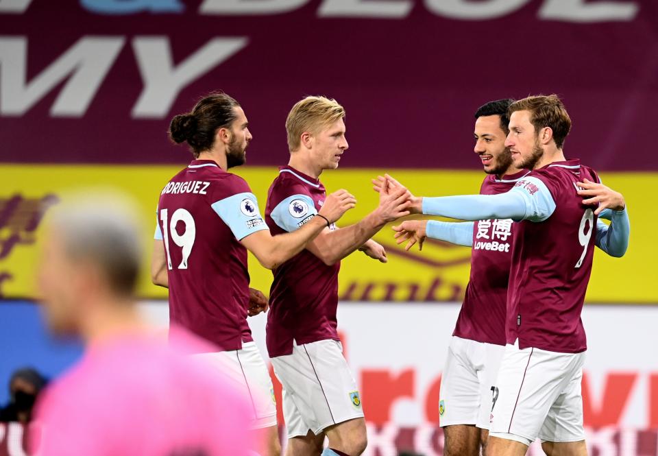 <p>Burnley celebrate the goal of Chris Wood</p> (AP)