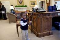 <b>Feb. 7, 2012:</b> "Kids will be kids. After the President had welcomed Lauren Fleming, the March of Dimes national ambassador, and her family in the Oval Office, her brother, Corbin Fleming, started to play with the President's telephone. Fortunately, he wasn't able to get through to a head of state." (Official White House Photo by Pete Souza)