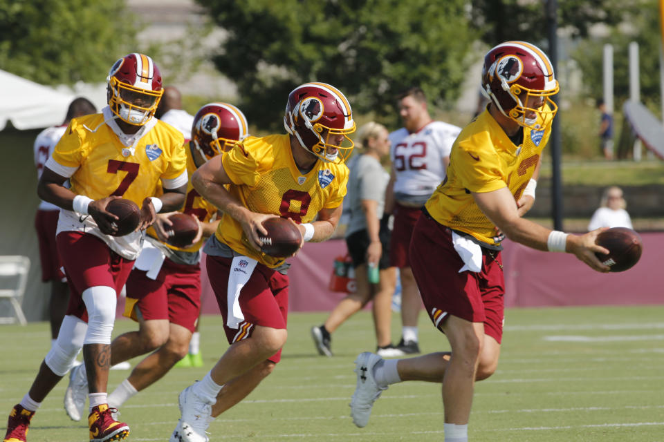 Three quarterbacks, no clear starter: Washington head coach Jay Gruden may start now-healthy Colt McCoy, right, over rookie Dwayne Haskins, left. Case Keenum, center, was benched on Sunday. (AP) 