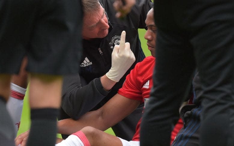 Anthony Martial of Manchester United is checked for concussion during a Premier League game2016 - Copyright (c) 2016 Rex Features. No use without permission.