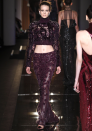 Versace AW13 Couture: Models bared their midriff in long-sleeved crop tops and maxi skirts.