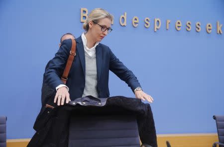 Alice Weidel, top candidate of the anti-immigration party Alternative fuer Deutschland (AfD) arrives for a news conference in Berlin, Germany, September 25, 2017. REUTERS/Wolfgang Rattay