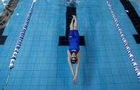 Palestinian swimmer Mary Al-Atrash, 22, who will represent Palestine at the 2016 Rio Olympics, train in a swimming pool in Beit Sahour, near the West Bank town of Bethlehem June 27, 2016. REUTERS/Ammar Awad