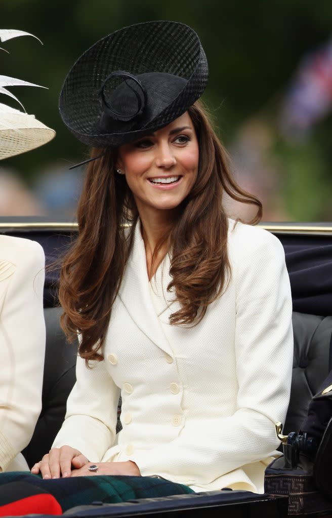 Kate Middleton makes her way down the Mall during the Trooping the Colour in 2011