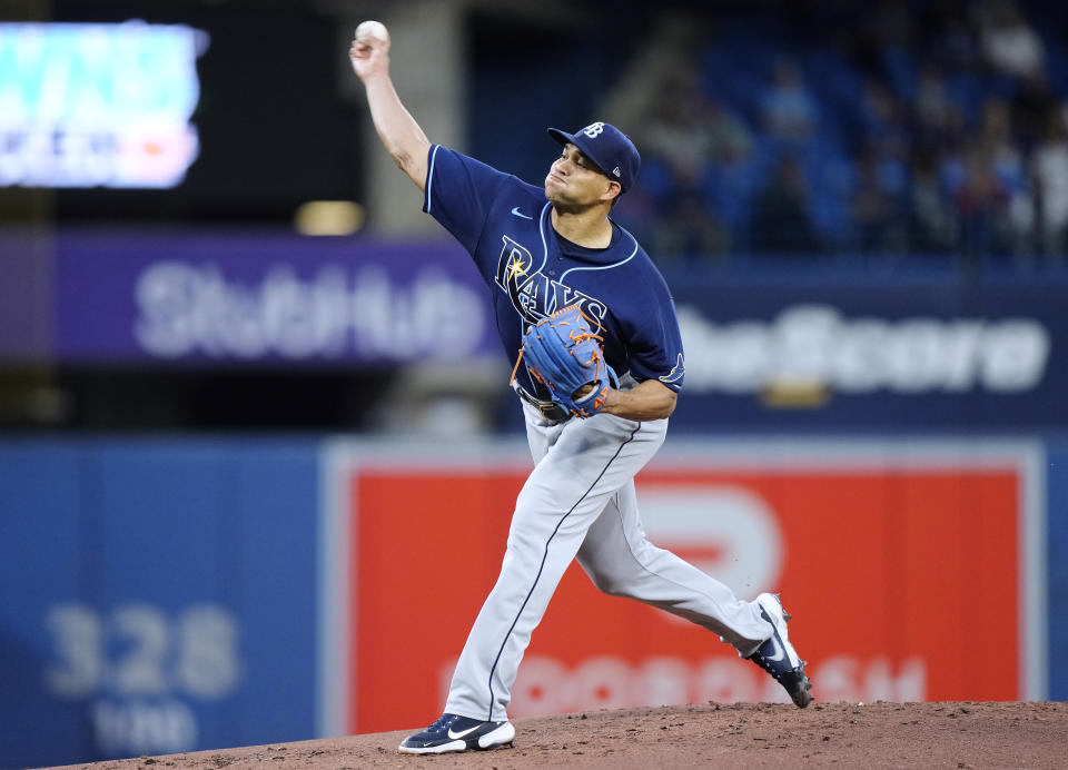 Tampa Bay Rays starting pitcher Yonny Chirinos throws to a Toronto Blue Jays batter during the first inning of the second baseball game of a doubleheader Tuesday, Sept. 13, 2022, in Toronto. (Frank Gunn/The Canadian Press via AP)